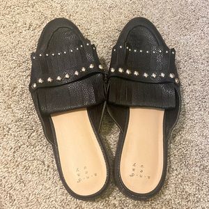 Black fringed loafers